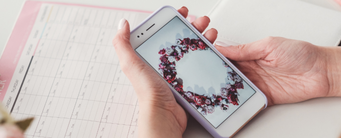 A smartphone displaying ROI analytics and graphs, symbolising the importance of tracking social media ROI for business success