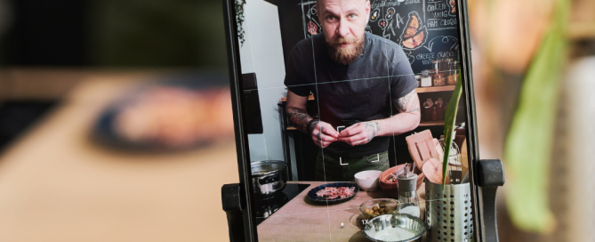 Business owner recording a video for user-generated content, showcasing authentic engagement